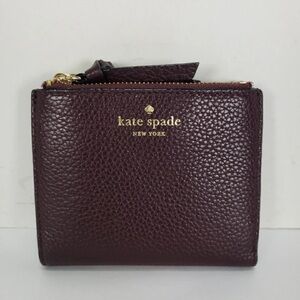 KATE SPADE MULBERRY STREET
SMALL MALEA EGGPLANT PEBBLED LEATHER BILFOLD
WALLET